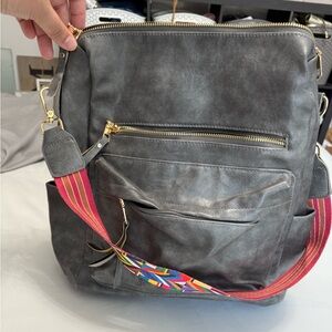 Gray Backpack with Colorful Strap